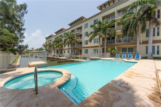 5909 Padre Blvd Unit 201, South Padre Island, TX 78597 - community pool featuring a hot tub and a patio