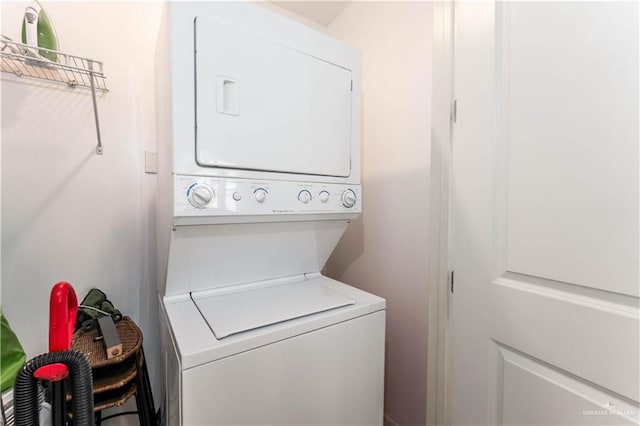 5909 Padre Blvd Unit 201, South Padre Island, TX 78597 - laundry area featuring stacked washer and clothes dryer