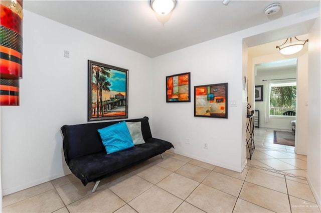 5909 Padre Blvd Unit 201, South Padre Island, TX 78597 - sitting room with light tile patterned floors and baseboards