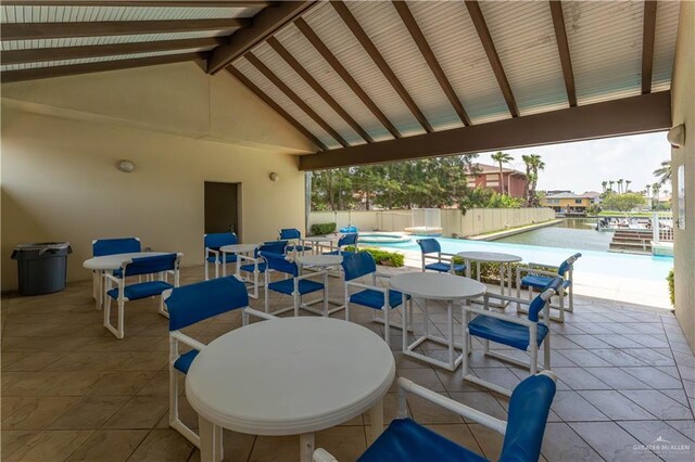 5909 Padre Blvd Unit 201, South Padre Island, TX 78597 - view of patio featuring outdoor dining area