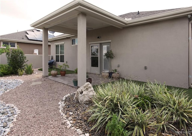 back of property with a patio area