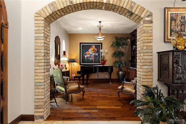 1509 Duke Ave, Mcallen, TX 78504 - living area featuring arched walkways, wood finished floors, and recessed lighting