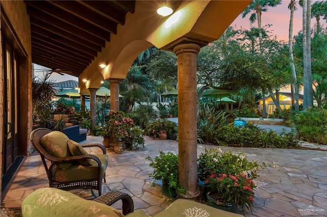 1509 Duke Ave, Mcallen, TX 78504 - patio terrace at dusk featuring a patio