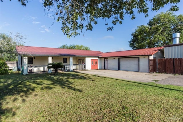 ranch-style house with a garage and a front lawn