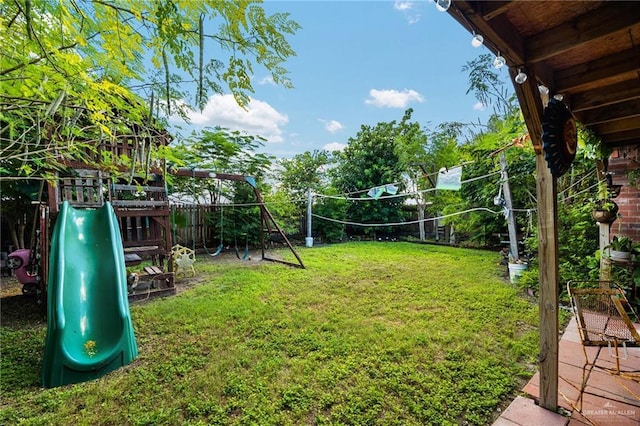 view of yard with a playground