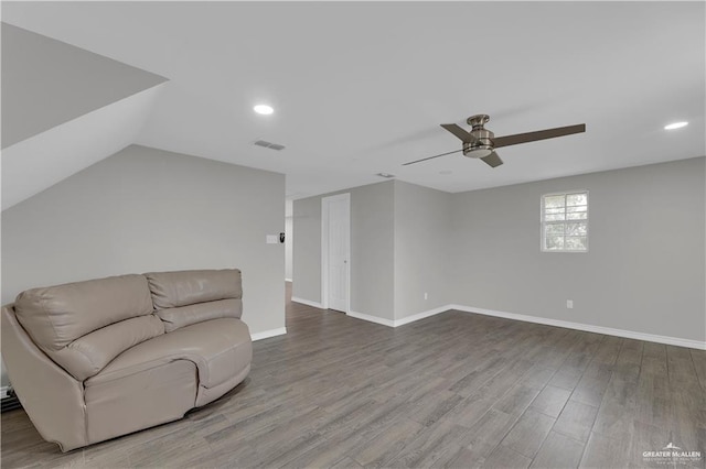 unfurnished living room with ceiling fan and wood-type flooring