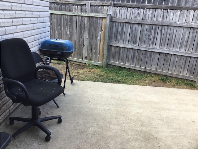 view of patio / terrace featuring a grill