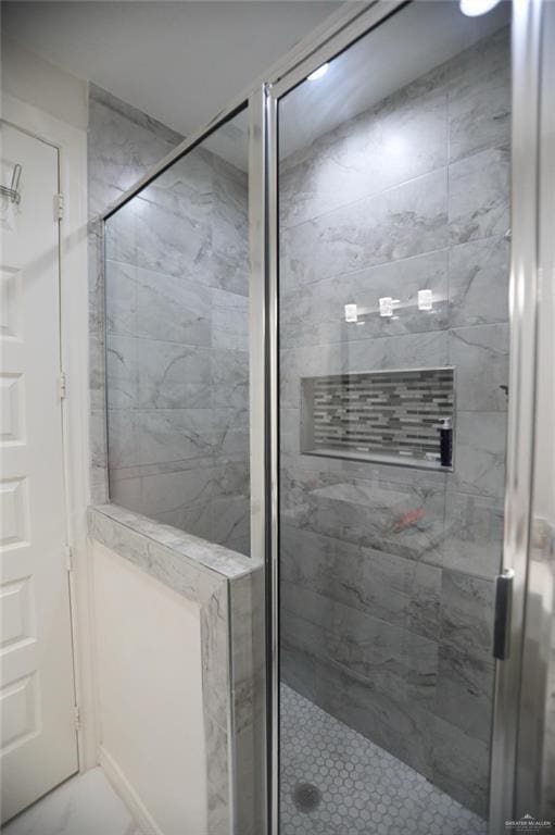 bathroom with walk in shower