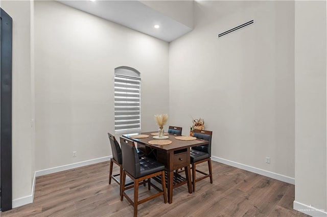 1620 Stonegate Dr, Mission, TX 78574 - dining room featuring wood finished floors, baseboards, and recessed lighting