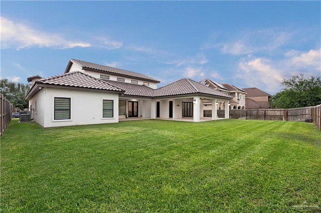 1620 Stonegate Dr, Mission, TX 78574 - rear view of property with a tiled roof, a patio area, stucco siding, and central air condition unit