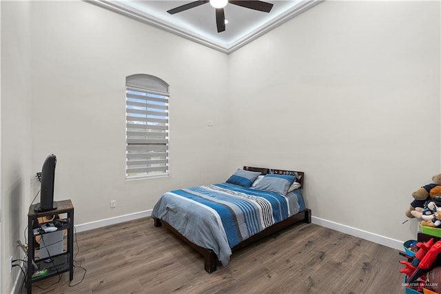 1620 Stonegate Dr, Mission, TX 78574 - bedroom with wood finished floors, baseboards, and a ceiling fan