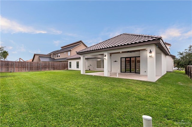 1620 Stonegate Dr, Mission, TX 78574 - rear view of property featuring a patio area, a ceiling fan, stucco siding, and a tile roof