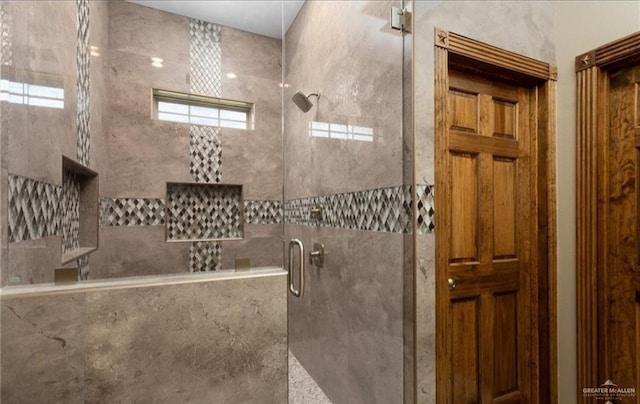 bathroom featuring walk in shower