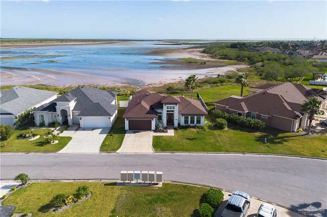 aerial view featuring a water view