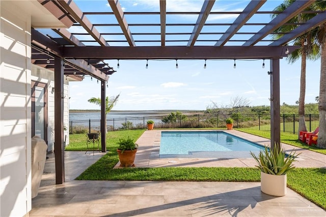 view of swimming pool featuring a pergola, a patio area, a yard, and a water view