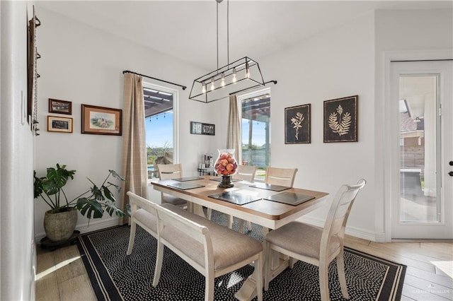 dining space featuring light hardwood / wood-style floors