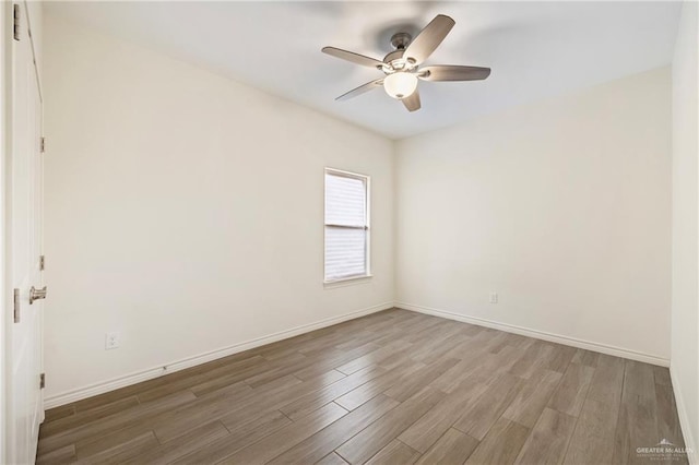 7303 Umar Ave, Mission, TX 78573 - unfurnished room featuring wood finished floors, ceiling fan, and baseboards