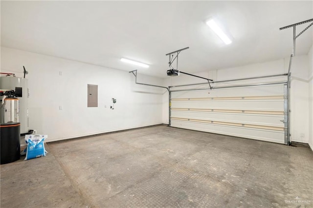 7303 Umar Ave, Mission, TX 78573 - garage with electric panel and a garage door opener