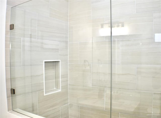 bathroom with an enclosed shower