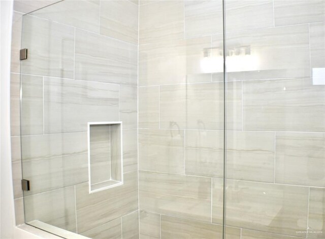 bathroom with an enclosed shower