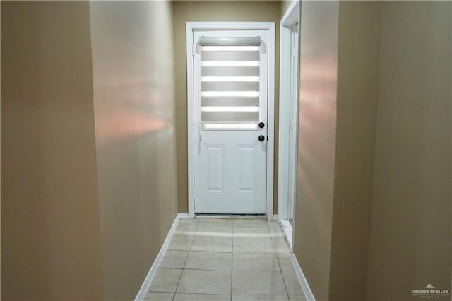 doorway featuring light tile patterned floors