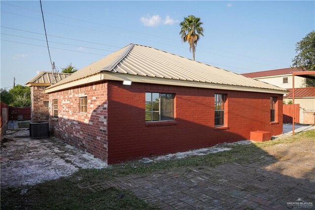 view of home's exterior featuring central AC unit