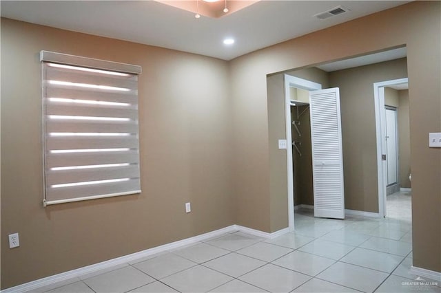 view of tiled spare room