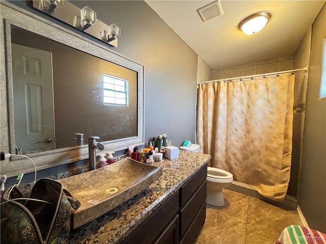 16400 Mcalister Ave, Edinburg, TX 78541 - bathroom with vanity, toilet, a shower with curtain, and tile patterned flooring