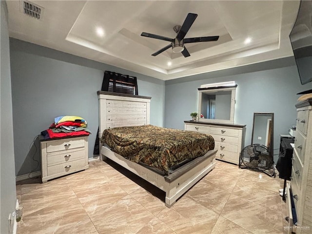 16400 Mcalister Ave, Edinburg, TX 78541 - bedroom featuring a tray ceiling, a ceiling fan, baseboards, and recessed lighting