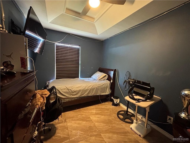 16400 Mcalister Ave, Edinburg, TX 78541 - bedroom with a raised ceiling, baseboards, and a ceiling fan