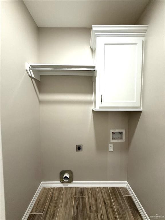 laundry area featuring hookup for an electric dryer, washer hookup, and dark hardwood / wood-style floors