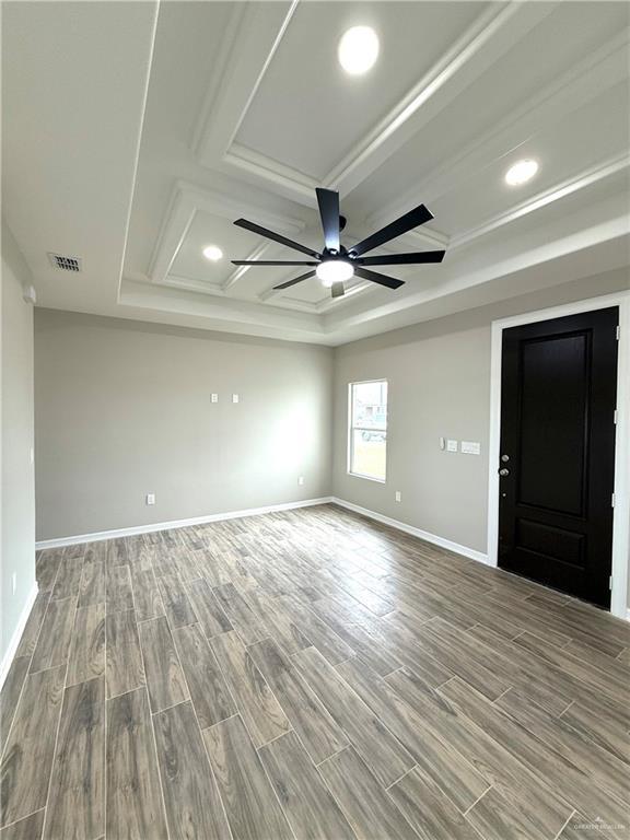 unfurnished room with ceiling fan