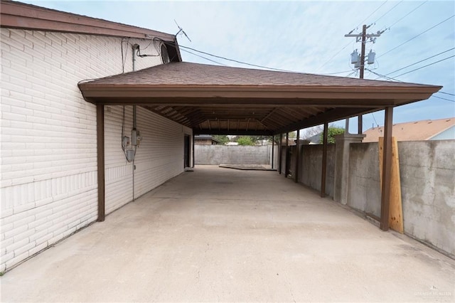 view of parking with a carport