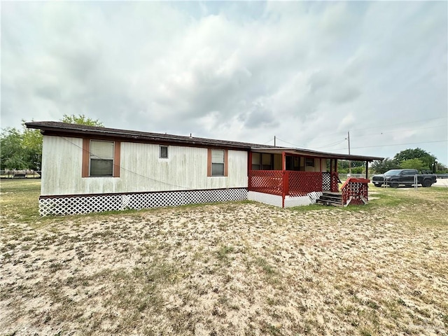 8110 Lake Citrus Dr, Edinburg, TX 78541 - back of house with a yard