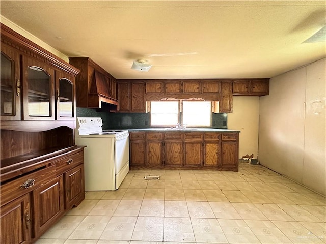 8110 Lake Citrus Dr, Edinburg, TX 78541 - kitchen featuring white range with electric stovetop, light tile patterned floors, and a sink