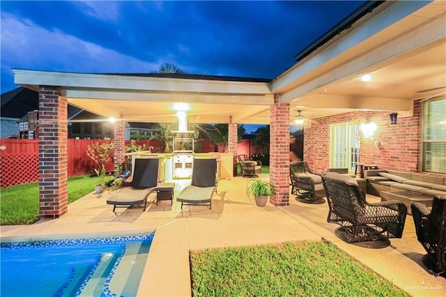 view of patio with a fenced in pool and outdoor lounge area