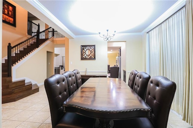 dining room featuring light tile patterned floors, crown molding, and a notable chandelier