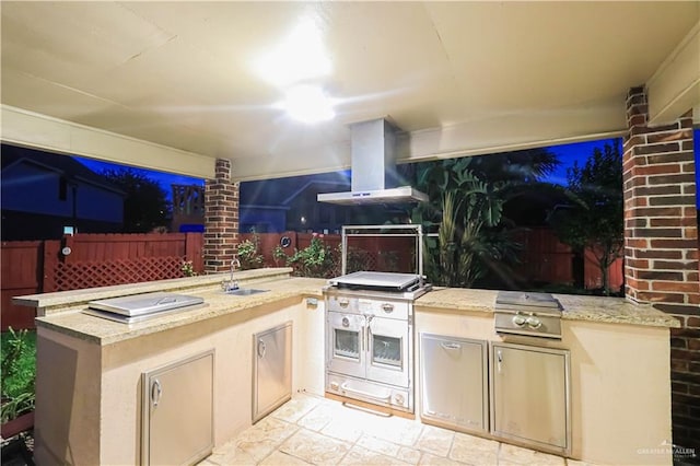 view of patio / terrace with area for grilling, grilling area, and sink