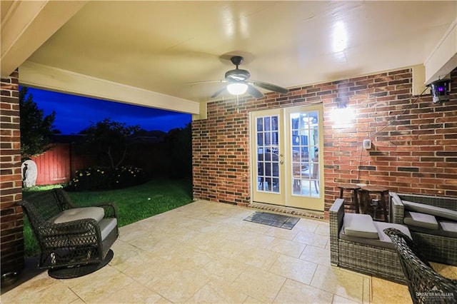 view of patio featuring ceiling fan and french doors