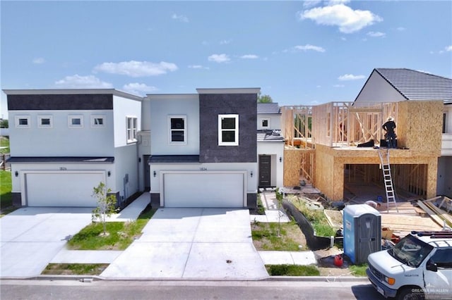 view of front of property with a garage