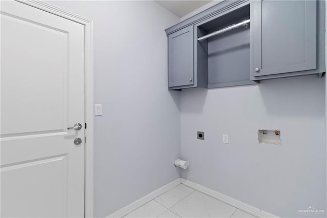 laundry area with cabinets, washer hookup, and electric dryer hookup