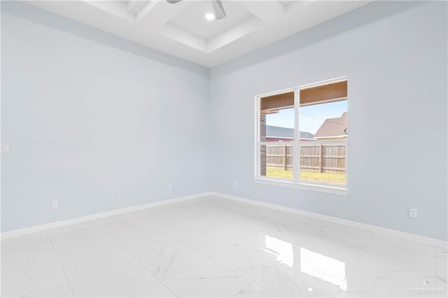 empty room with beamed ceiling and coffered ceiling