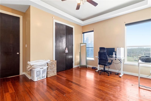 office featuring ceiling fan and hardwood / wood-style floors