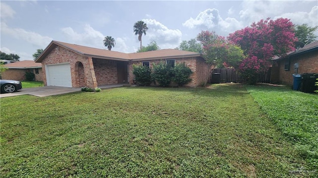 6200 N 31st St, Mcallen, TX 78504 - ranch-style home featuring brick siding, a garage, and concrete driveway