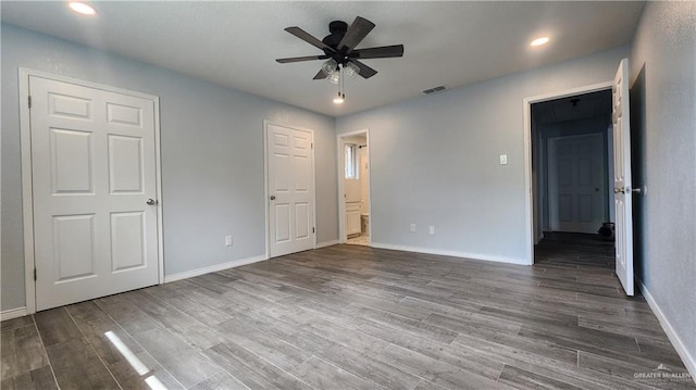 6200 N 31st St, Mcallen, TX 78504 - unfurnished bedroom featuring wood finished floors, baseboards, recessed lighting, ensuite bathroom, and ceiling fan
