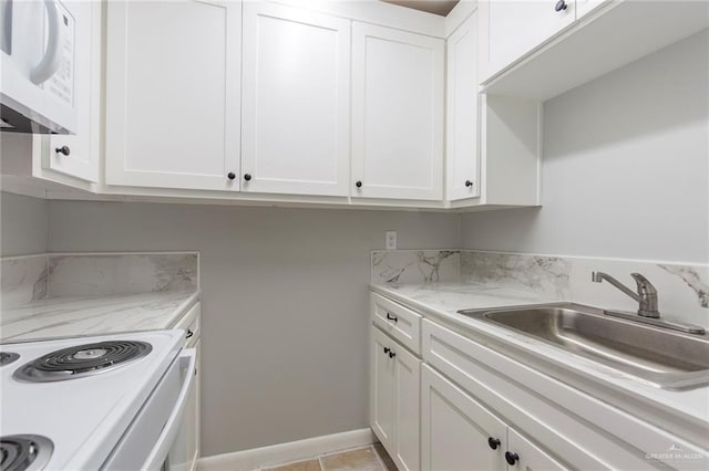 laundry area with sink