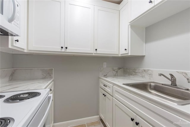 7504 US Highway 281, Edinburg, TX 78542 - laundry area featuring a sink