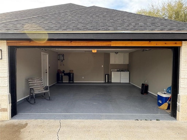 garage featuring independent washer and dryer