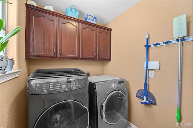 2504 April Ave, Edinburg, TX 78541 - laundry room with cabinet space and washer and dryer