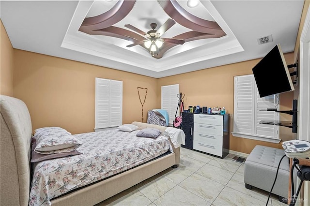 2504 April Ave, Edinburg, TX 78541 - bedroom featuring a raised ceiling and a ceiling fan